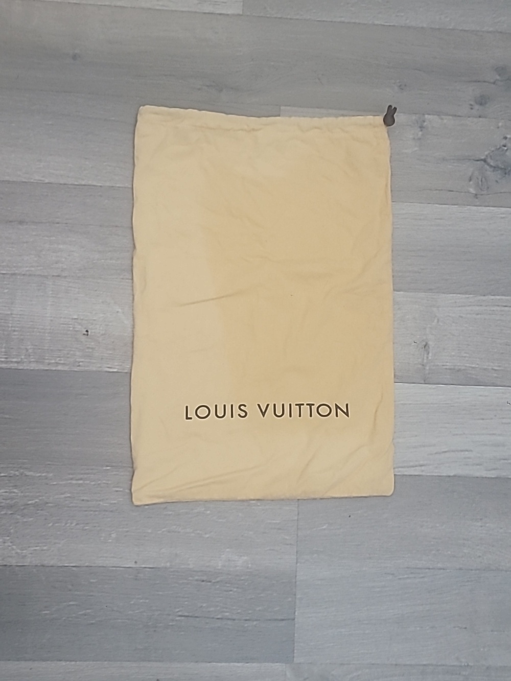 Louis Vuitton drawstring dust bag designed to protect luxury handbags 10x16